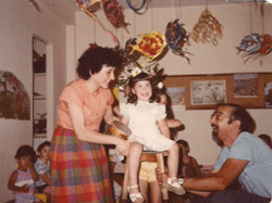 The author and her husband taking part in Shira's birthday celebration in an Israeli kindergarten.