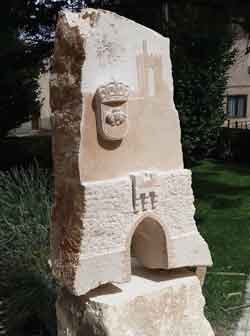 Sculpture of arched gateway into Aylon's old town.